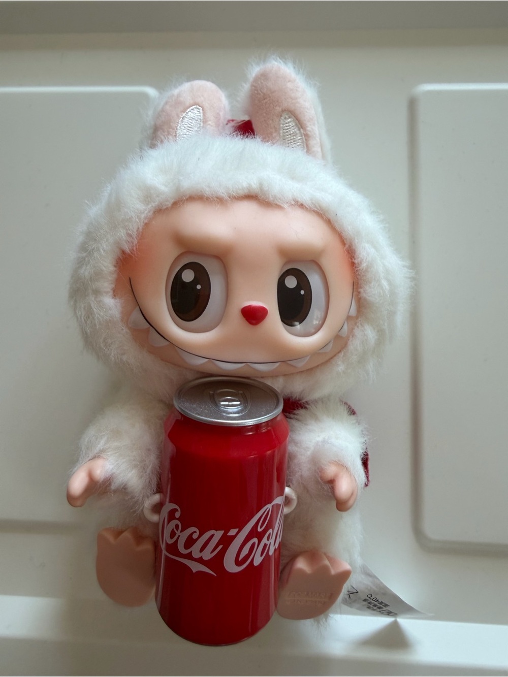 Labubu-White Plush Bunny Doll with Red Accent and Holding Red Can